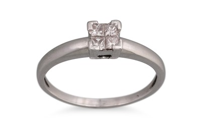 Lot 326 - A DIAMOND CLUSTER RING, the princess cut...