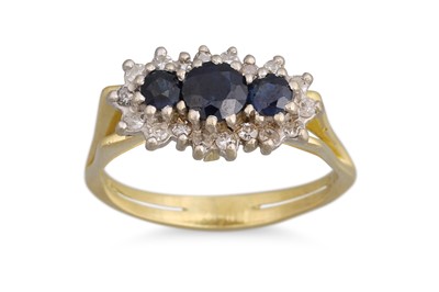 Lot 332 - A SAPPHIRE AND DIAMOND CLUSTER RING, the three...