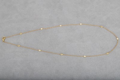 Lot 89 - A DIAMOND SET CHAIN NECKLACE, the collet set...