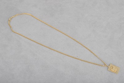 Lot 35 - A 14CT GOLD PENDANT, on a 14ct gold chain. 7.1 g.