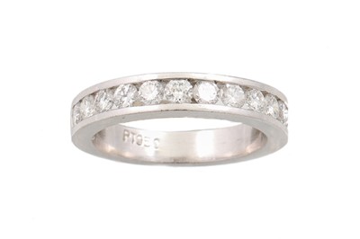 Lot 61 - A DIAMOND SET HALF ETERNITY RING, twelve round...