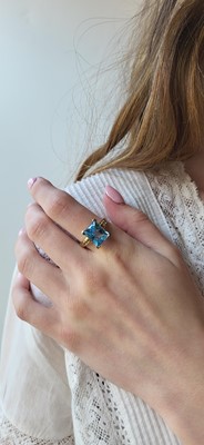 Lot 18 - A TOPAZ RING, mounted in 9ct yellow gold, size...