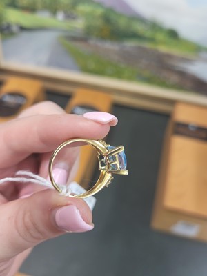 Lot 18 - A TOPAZ RING, mounted in 9ct yellow gold, size...