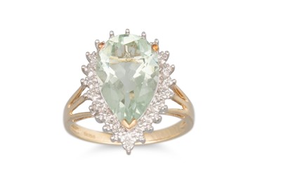Lot 108 - A GREEN QUARTZ CLUSTER RING, the pear shaped...
