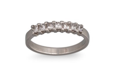 Lot 168 - A DIAMOND SEVEN STONE RING, the princess cut...