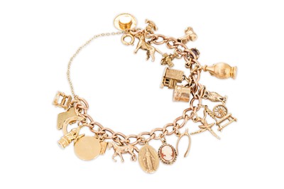 Lot 231 - A 9CT GOLD CHARM BRACELET, with various gold...