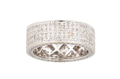 Lot 32 - A FOUR ROWED DIAMOND RING, pavé set in 18ct...