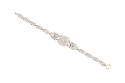 Lot 38 - A DIAMOND AND ROCK CRYSTAL SET BRACELET,...