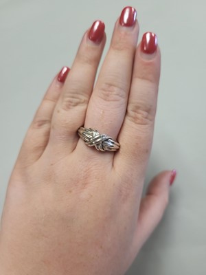 Lot 30 - A SILVER TIFFANY RING, x-shaped design, signed,...