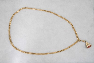 Lot 32 - AN ANTIQUE PINCHBECK SEAL PENDANT, set with...