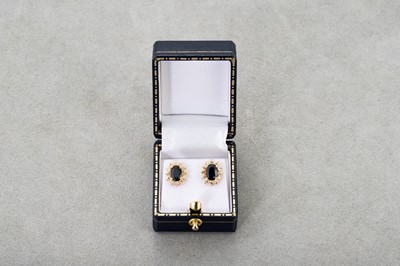 Lot 16 - A PAIR OF DIAMOND AND SAPPHIRE CLUSTER...