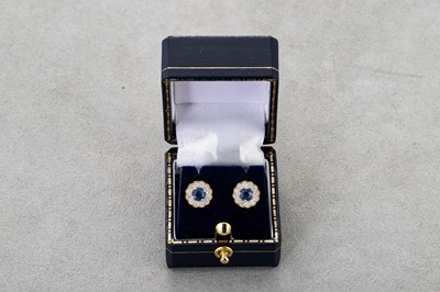 Lot 34 - A PAIR OF DIAMOND AND SAPPHIRE CLUSTER...