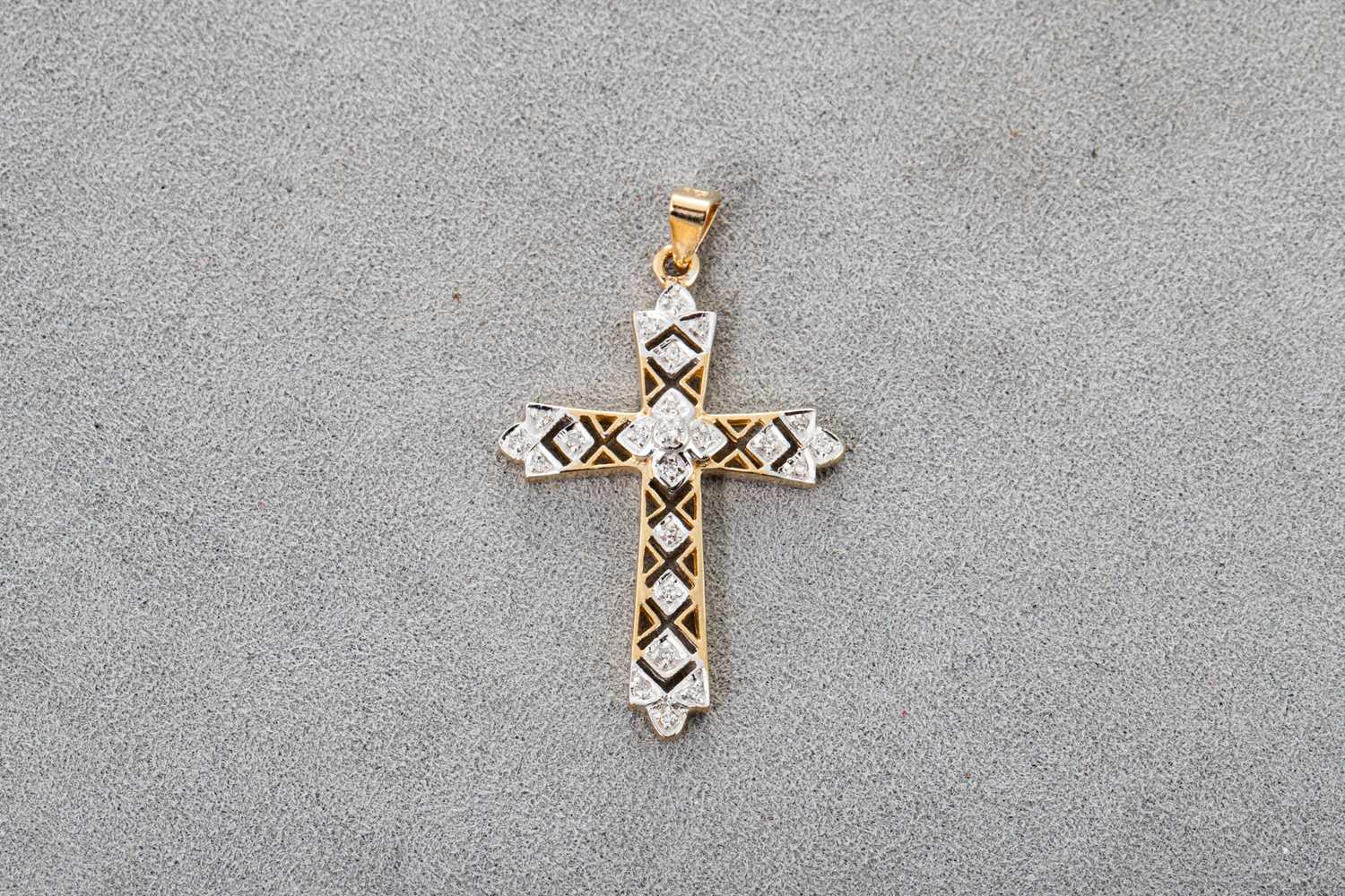 Lot 85 - A DIAMOND SET CROSS PENDANT, open work design,...