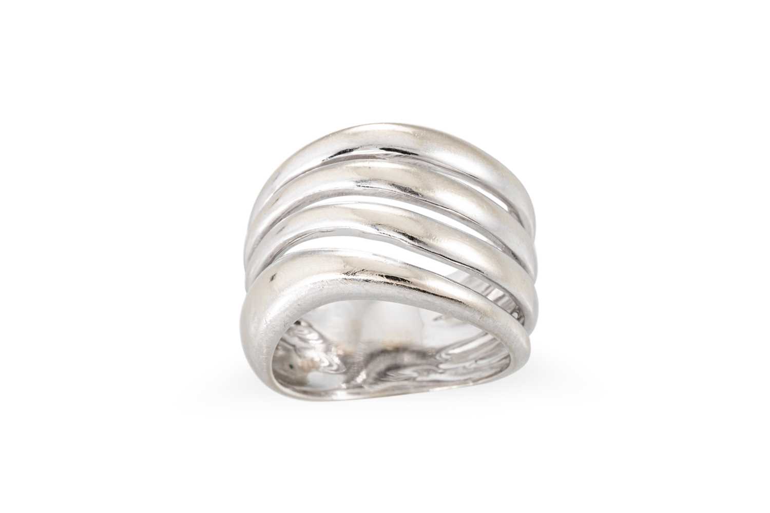 Lot 44 - A WHITE GOLD ITALIAN DESIGNER RING, split band...