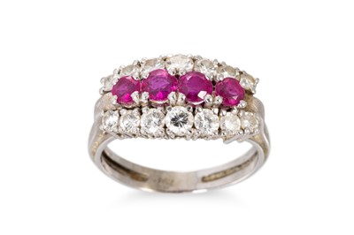 Lot 67 - A VINTAGE THREE ROWED DIAMOND AND RUBY BAND...