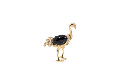 Lot 138 - AN 18CT GOLD DIAMOND AND ONYX BROOCH, in the...