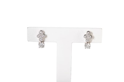 Lot 209 - A PAIR OF DIAMOND EARRINGS, mounted in 18ct...