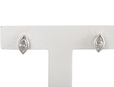 Lot 210 - A PAIR OF MARQUISE SET STUD EARRINGS, collet...
