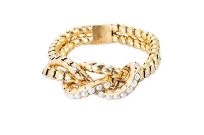 Lot 94 - AN EARLY 20TH CENTURY PEARL SET KNOT BRACELET,...