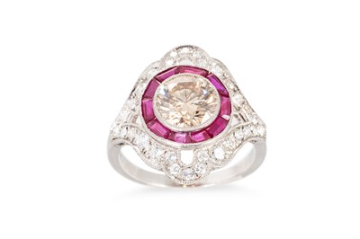 Lot 54 - A CHAMPAGNE DIAMOND AND RUBY TARGET RING, the...
