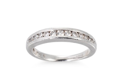 Lot 166 - A DIAMOND ETERNITY BAND, mounted in platinum....