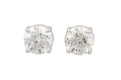 Lot 70 - A PAIR OF DIAMOND STUD EARRINGS, the brilliant...