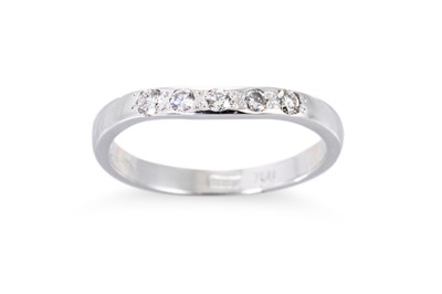Lot 142 - A DIAMOND SET BAND RING, the round brilliant...
