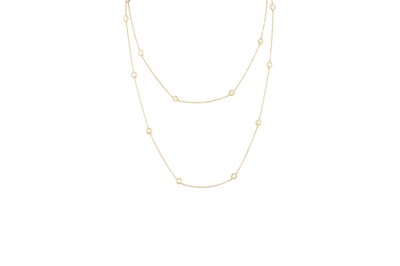 Lot 76 - A DIAMOND SET CHAIN, the collet set brilliant...