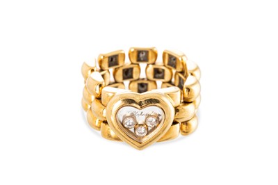 Lot 384 - A CHOPARD 'HAPPY DIAMOND' RING, diamond set,...