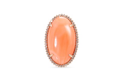 Lot 82 - A CORAL AND DIAMOND CLUSTER RING, the large...