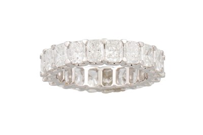 Lot 81 - A DIAMOND ETERNITY RING, the radiant cut...
