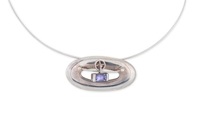 Lot 13 - A STERLING SILVER AND STONE SET PENDANT by...