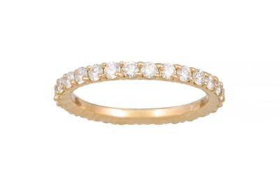 Lot 164 - A DIAMOND ETERNITY RING, the brilliant cut...