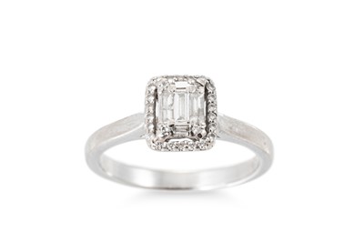 Lot 114 - A DIAMOND CLUSTER RING, the baguette and round...