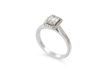 Lot 114 - A DIAMOND CLUSTER RING, the baguette and round...