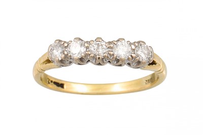 Lot 198 - A FIVE STONE DIAMOND RING, the brilliant cut...