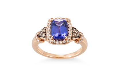 Lot 95 - A TANZANITE AND DIAMOND CLUSTER RING, the...