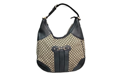 Lot 521 - A GUCCI 'JACKIE' FABRIC & LEATHER HANDBAG, the...