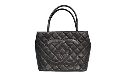 Lot 497 - A CHANEL LEATHER MEDALLION TOTE BAG, black...