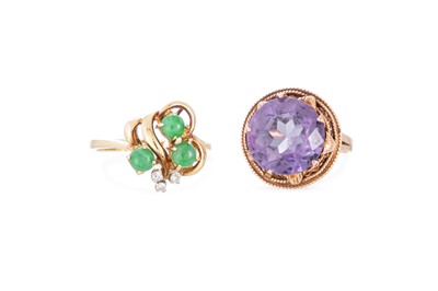 Lot 2 - A DIAMOND AND GEM SET RING, of abstract form...