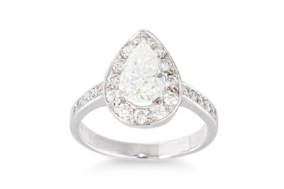 Lot 181 - A DIAMOND CLUSTER RING, the pear shaped...