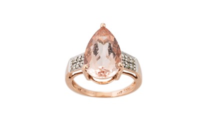 Lot 357 - A MORGANITE AND DIAMOND RING, the pear cut...