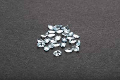 Lot 262 - A BAG OF AQUAMARINE STONES, unmounted,...