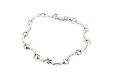 Lot 304 - A 9CT WHITE GOLD FANCY LINK BRACELET, 6.8 g.