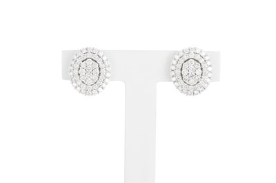 Lot 284 - A PAIR OF DIAMOND CLUSTER EARRINGS, the round...