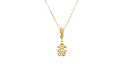 Lot 386 - A DIAMOND SET PENDANT, the shaped panel in...