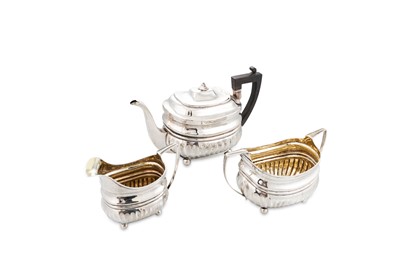 Lot 590 - A GEORGIAN ENGLISH STERLING SILVER THREE-PIECE...