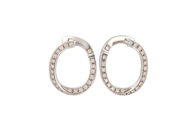 Lot 388 - A PAIR OF DIAMOND EARRINGS, circular panels...