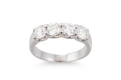Lot 289 - A FOUR STONE DIAMOND RING, the brilliant cut...