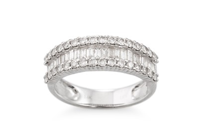Lot 293 - A DIAMOND TRIPLE ROW BAND RING, the graduated...